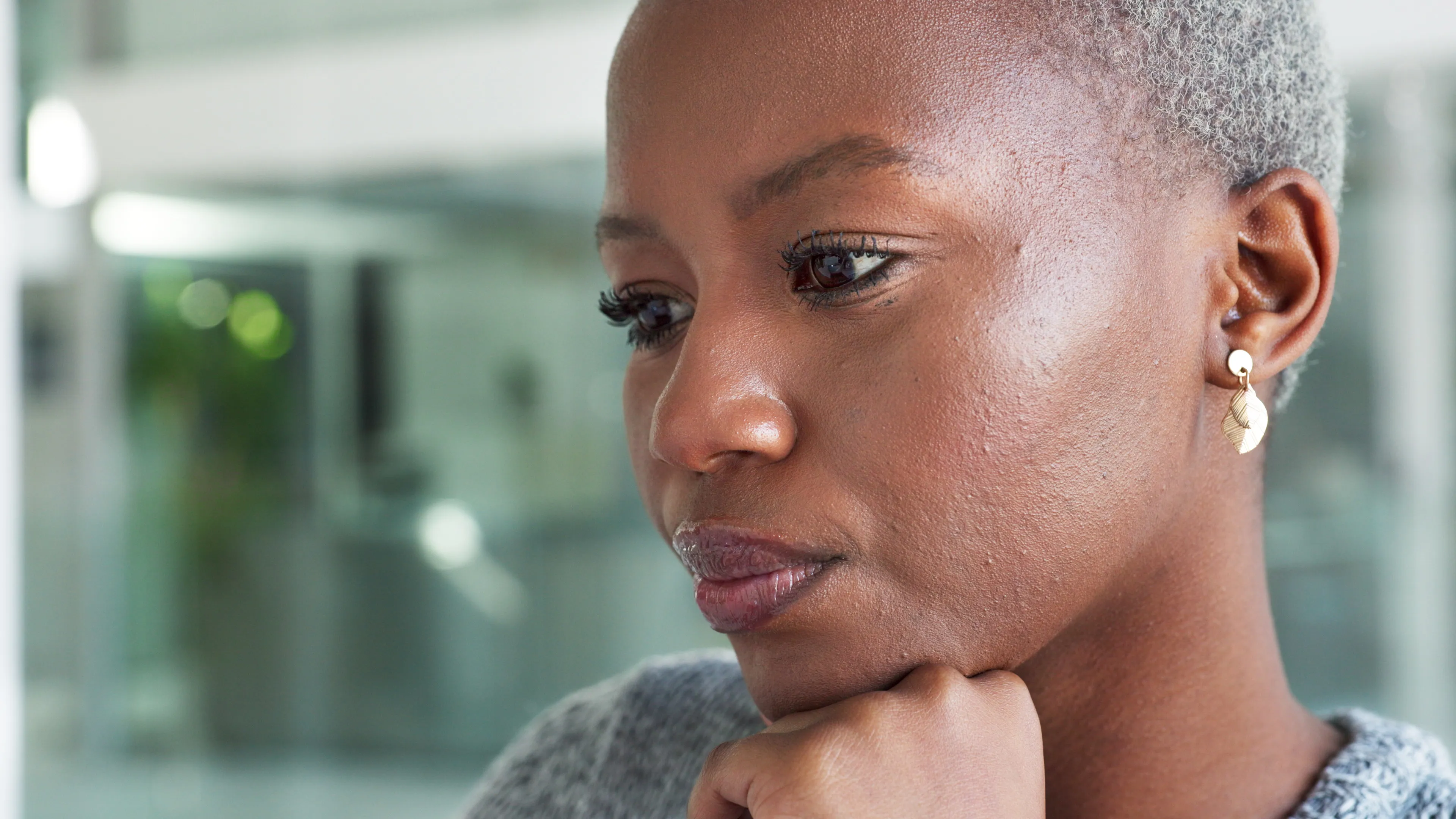 Woman showing calm confidence in thoughtful pose