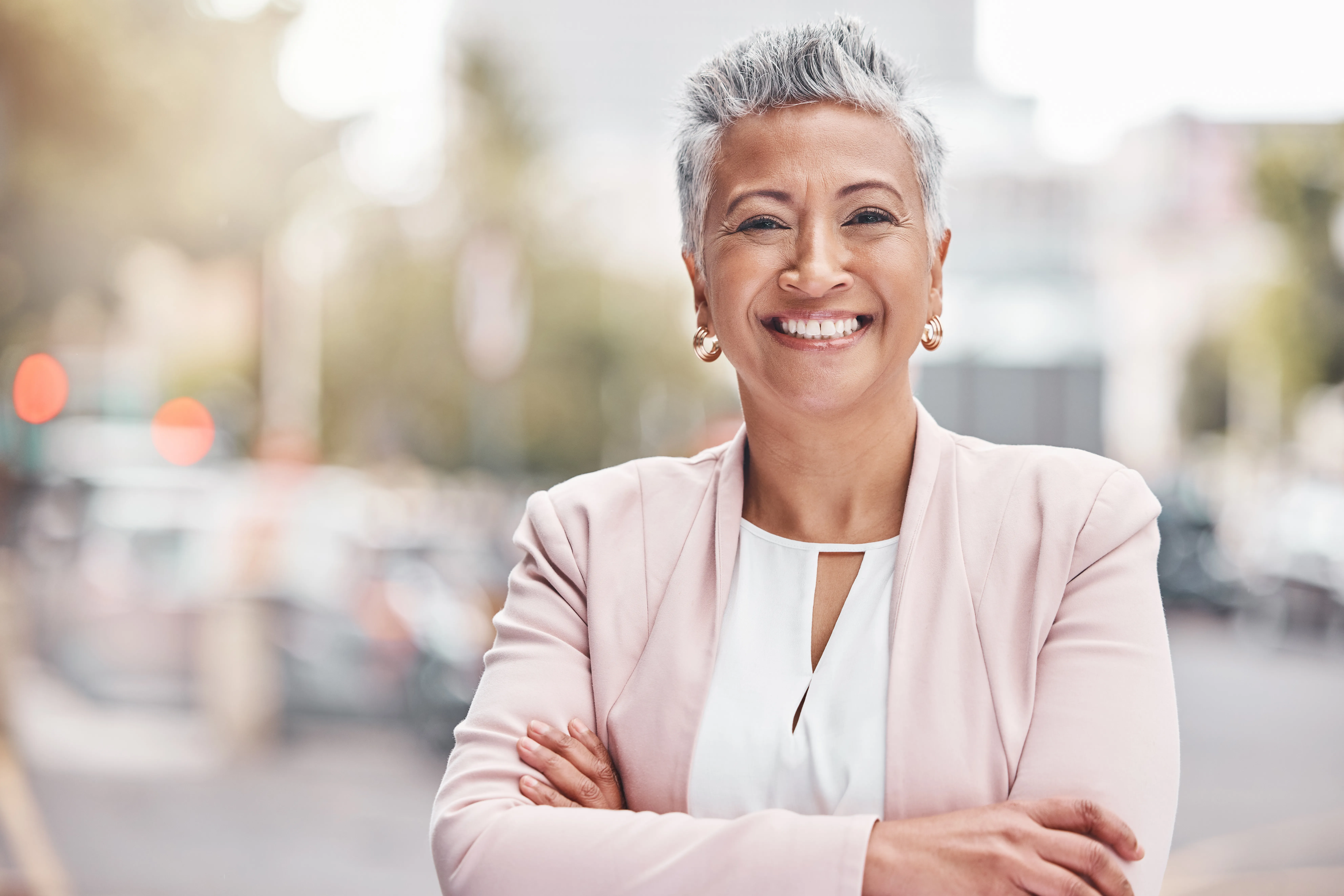 Woman feeling calm, confident, and radiant in natural light